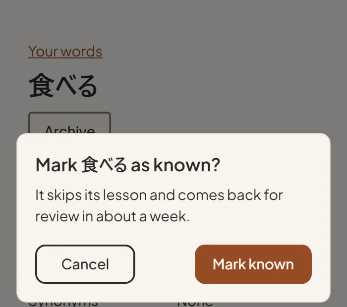 A dialog asking “Mark 食べる as known?”, saying it skips its lesson and comes back for review in about a week